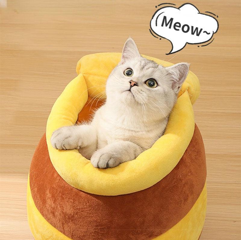 Katzenbett Honigtopf-Design, gemütlich und weich, ideal für alle Jahreszeiten. Perfektes Haustierbett für Katzen, bietet Komfort und Stil.