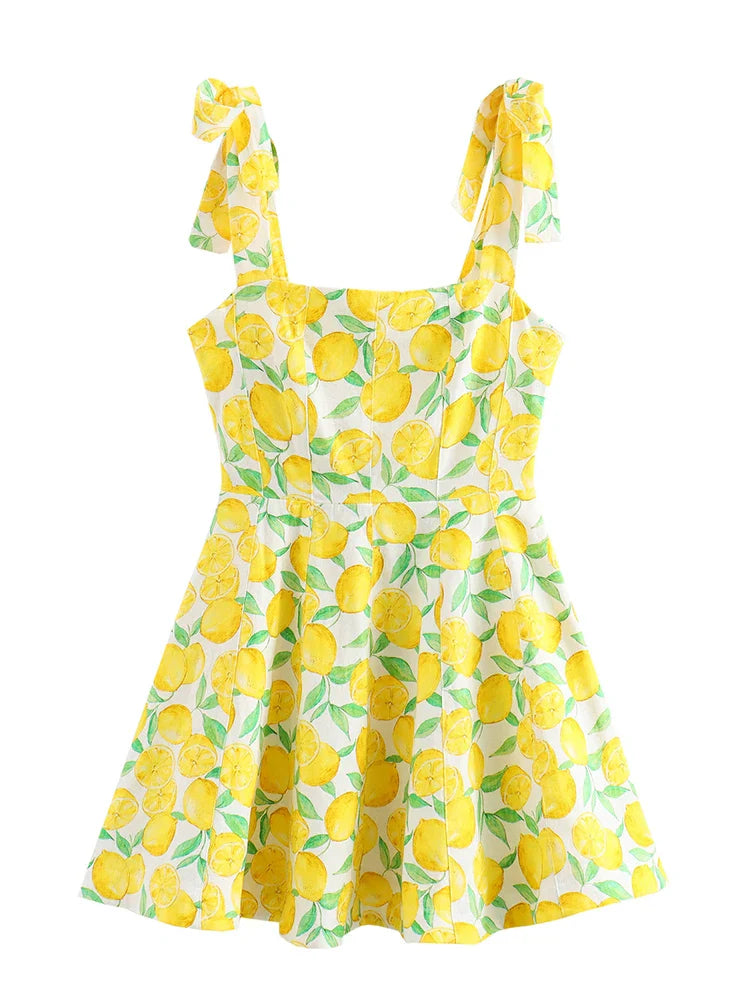 Sommerkleid mit Zitronenmuster, ärmellos, gelb-weiß, knielang, aus Baumwolle, ideal für Strandmode und Freizeitkleidung.