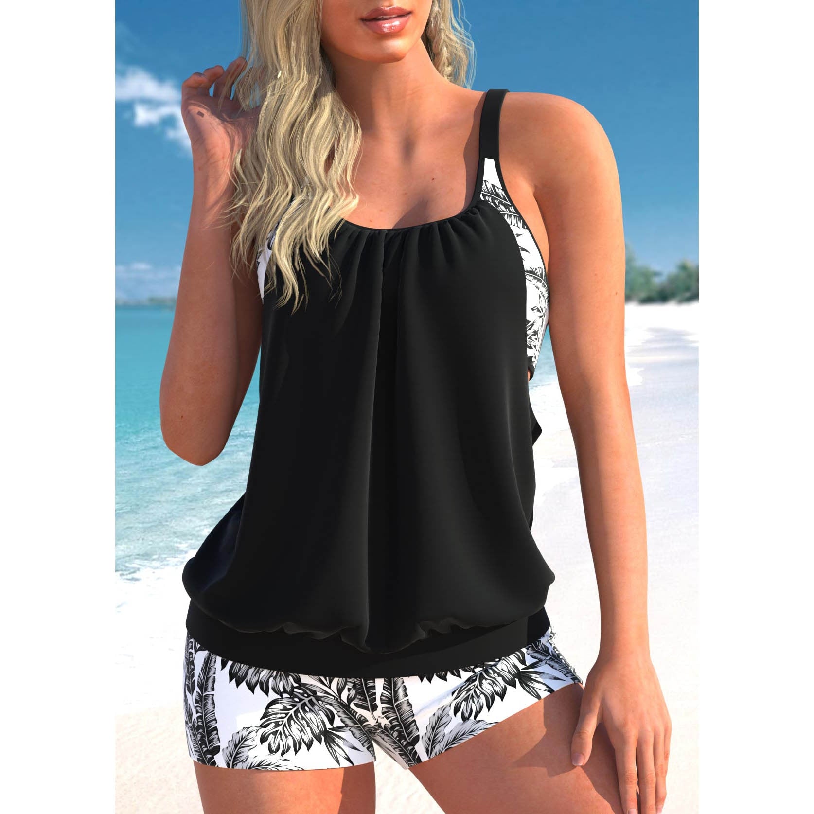Damen Tankini Set, schwarz-weiß, mit tropischem Muster. Perfekt für Strand und Sommer. Modische Bademode, bequem und stilvoll.