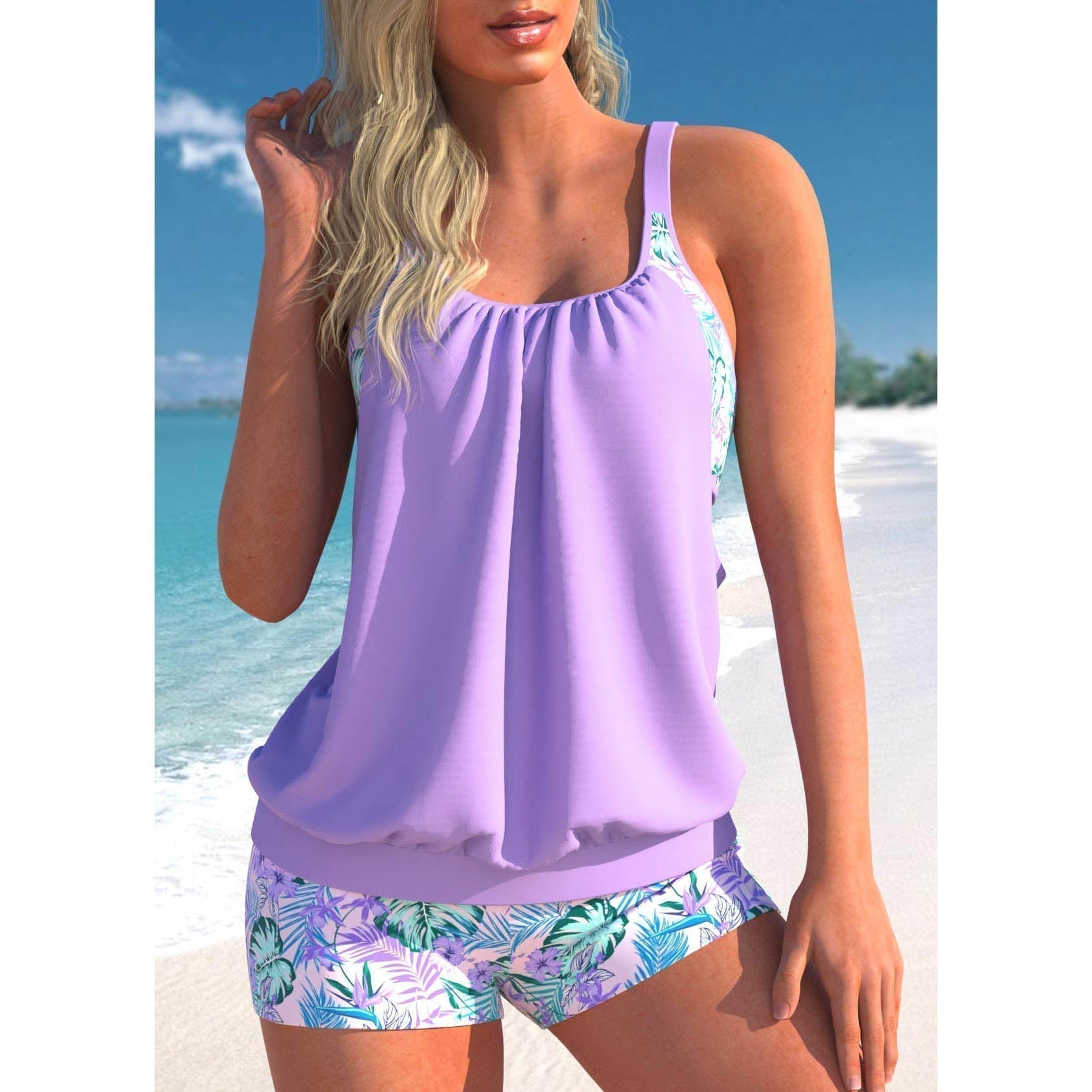 Damen-Tankini-Set in Lila mit tropischem Muster, ideal für den Sommerstrand. Bequeme Passform, modisch und perfekt für den Strandurlaub.