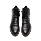 Schwarze Lederstiefeletten für Herren, elegant und modern, mit seitlichem Reißverschluss. Perfekt für Business und Freizeit. Hochwertige Verarbeitung.