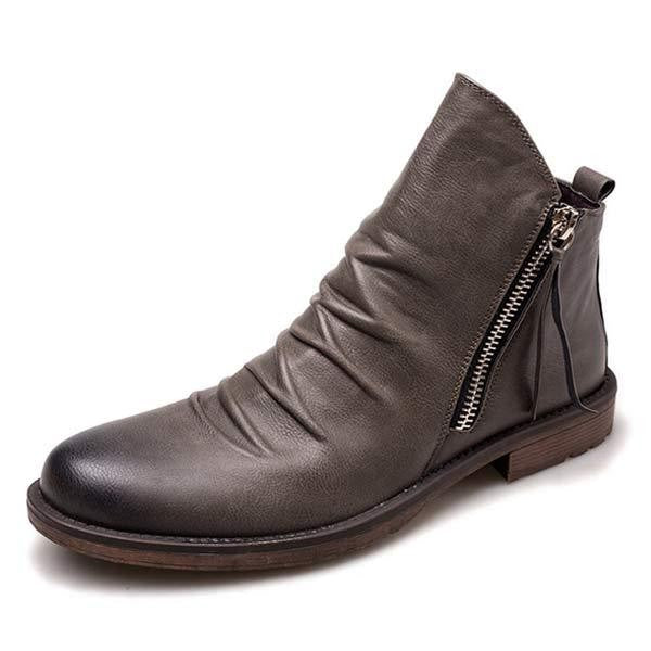 Grauer Herrenstiefel aus Leder mit seitlichem Reißverschluss, modisch und bequem. Perfekt für Herbst und Winter. Hochwertige Herrenschuhe.