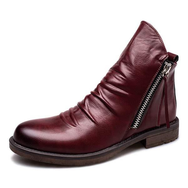 Damenstiefelette aus Leder in Bordeauxrot mit seitlichem Reißverschluss. Modischer, bequemer Schuh für Herbst und Winter. Ideal für Casual-Looks.