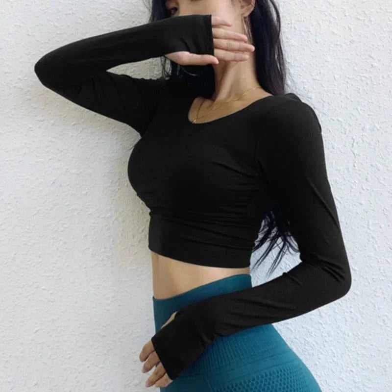 Langärmliges Sportshirt für Damen, schwarz, mit Streifen-Design, ideal für Fitness und Yoga. Atmungsaktiv, elastisch, modisch.