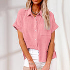 Lässige Kurzarmbluse aus Leinen in Rosa, ideal für Sommermode. Perfekt kombinierbar, atmungsaktiv und stilvoll für Damen.