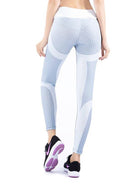 Sportliche Leggings in Weiß und Grau, ideal für Fitness und Yoga. Atmungsaktives Material, hoher Tragekomfort, modernes Design.