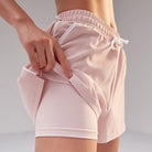 Damen Sportshorts, rosa, atmungsaktiv, elastisch, ideal für Fitness und Laufen. Bequeme Passform, modisch und funktional.