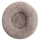 Rundes, flauschiges Hundebett in Beige, ideal für kleine bis mittelgroße Hunde. Komfortabel, waschbar und perfekt für erholsamen Schlaf.