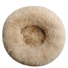 Rundes, flauschiges Hundebett in Beige, ideal für kleine bis mittelgroße Hunde. Komfortabel, waschbar, rutschfest. Perfekt für Haustierentspannung.