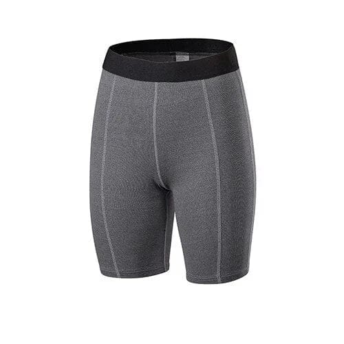 Graue mittellange Sportshorts für Damen, atmungsaktiv und elastisch, ideal für Fitness und Yoga. Perfekte Passform und hoher Tragekomfort.