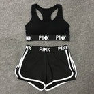 Schwarzes Sportset für Damen, bestehend aus Sport-BH und Shorts mit "PINK"-Aufschrift. Ideal für Fitness, Laufen und Yoga. Größe M.