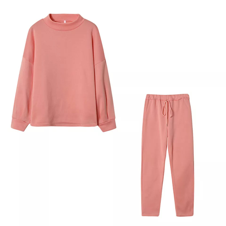 Rosa Damen-Sweatshirt und Jogginghose Set, bequem und modisch, ideal für Freizeit und Sport. Perfekt für gemütliche Tage zu Hause.