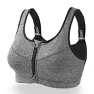 Grauer Sport-BH in großen Größen mit Reißverschluss, ideal für Fitness und Training. Bequeme Passform, atmungsaktives Material, starker Halt.