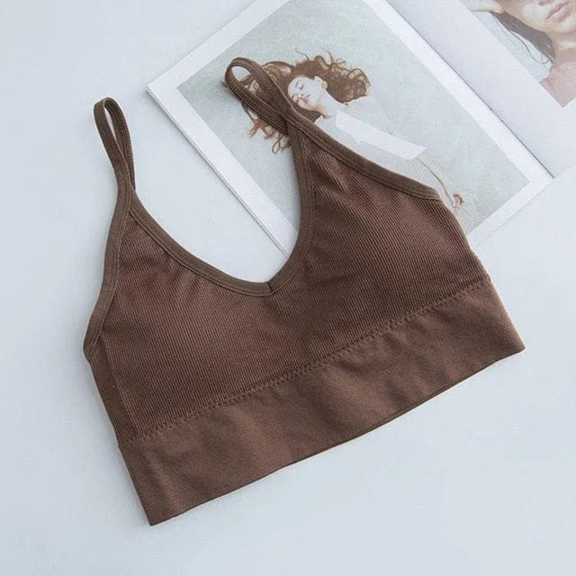 Brauner Sport-BH mit dünnen Trägern, nahtlos und bequem, ideal für Yoga und Fitness. Hochwertige Materialien, modisches Design.