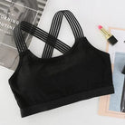 Schwarzer Sport-BH mit gekreuzten Trägern, ideal für Fitness und Yoga. Atmungsaktives Material, modisches Design, hoher Tragekomfort.