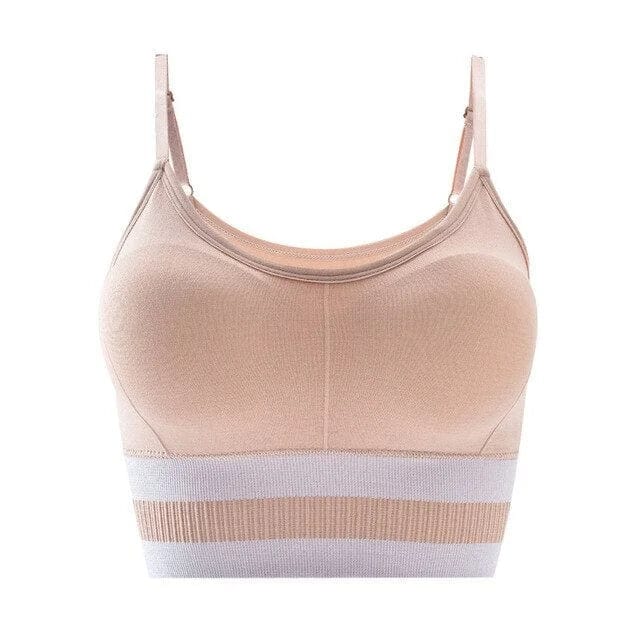Beiger Sport-BH mit Trägern, nahtlos und atmungsaktiv, ideal für Fitness und Yoga. Komfortable Passform, elastisches Material, universelle Größe.