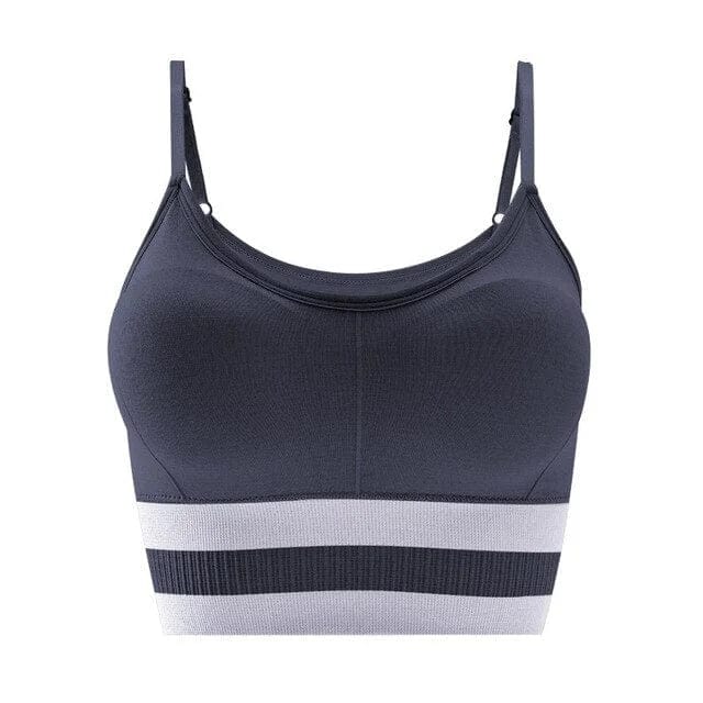 Grauer Sport-BH mit Trägern, nahtlos und atmungsaktiv, ideal für Fitness und Yoga. Komfortable Passform, elastisches Material, modisches Design.