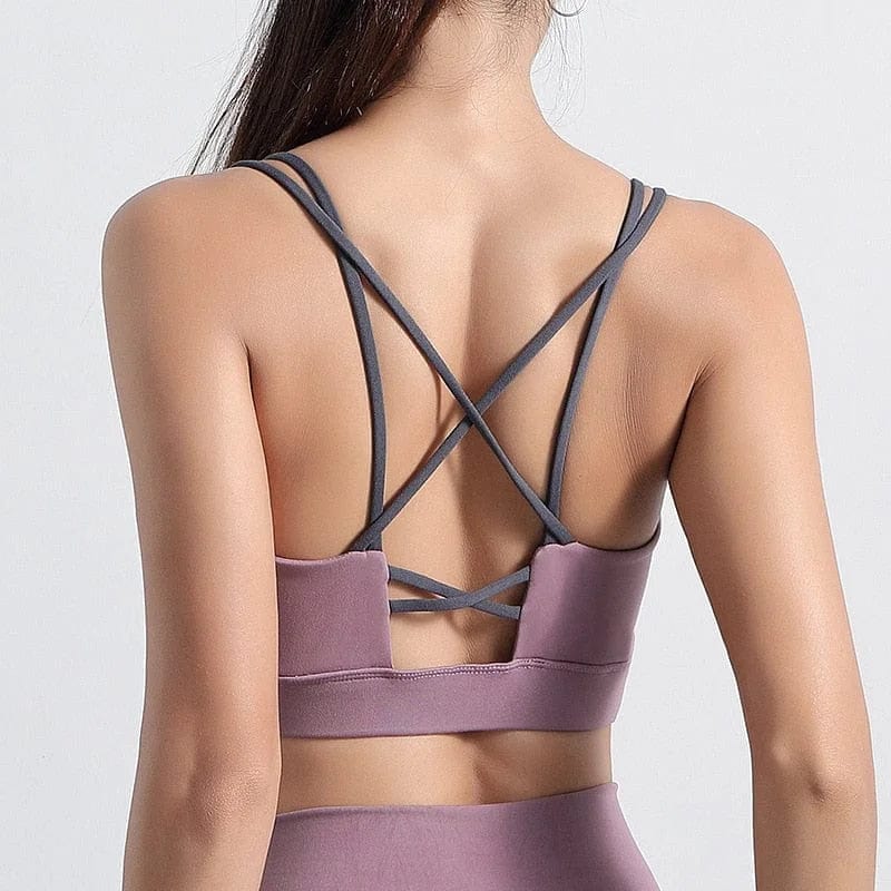 Sport-BH mit Zier-Rücken in Rosa, ideal für Yoga und Fitness. Atmungsaktives Material, modisches Design, perfekte Passform für aktive Frauen.