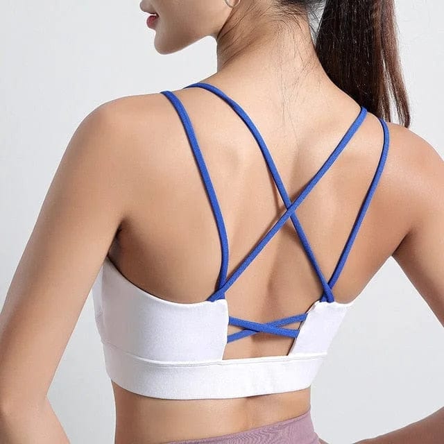 Sport-BH mit Zier-Rücken in Weiß, blaue Träger, ideal für Fitness und Yoga. Atmungsaktiv, bequem, modisch. Perfekt für aktive Frauen.