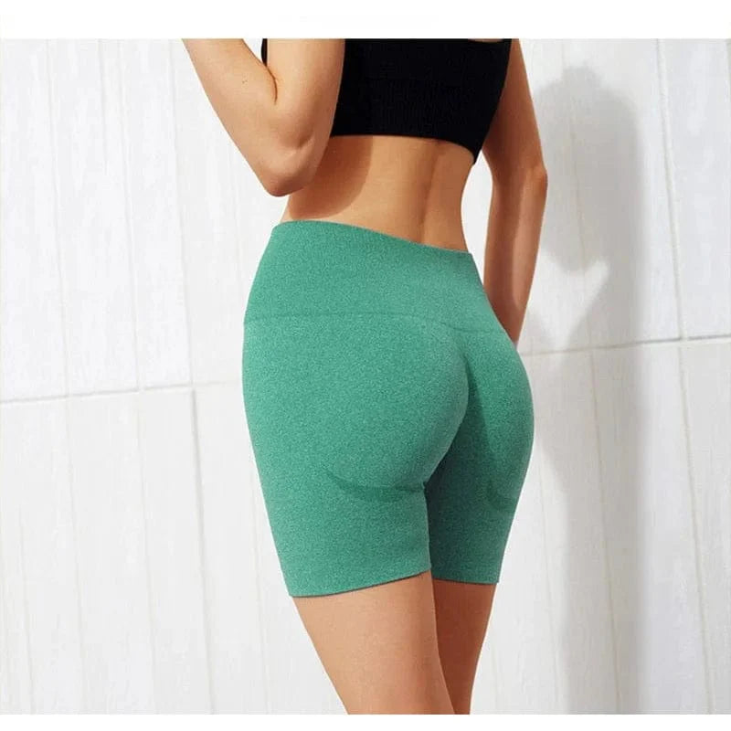 Damen-Sporthose in Grün, nahtlos, ideal für Fitness und Yoga. Bequeme Passform, atmungsaktiv, elastisch. Perfekt für Sport und Freizeit.