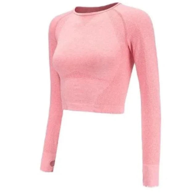 Sportliches rosa Langarmshirt mit Daumenloch, ideal für Fitness und Yoga. Atmungsaktives Material, figurbetont, Größe S.