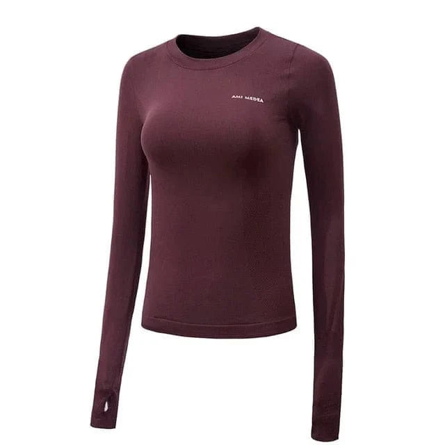 Sportliches Damen-Top in Rotweinfarbe mit Daumenausschnitt, langärmelig, ideal für Fitness und Freizeit. Hochwertiges Material, figurbetont.