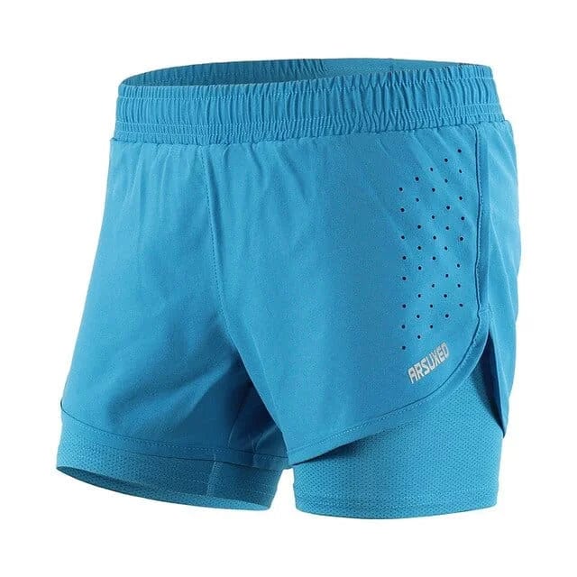 Blaue Sportshorts mit engem Beinabschluss, atmungsaktivem Material und elastischem Bund. Ideal für Fitness und Laufen. Größe XS verfügbar.