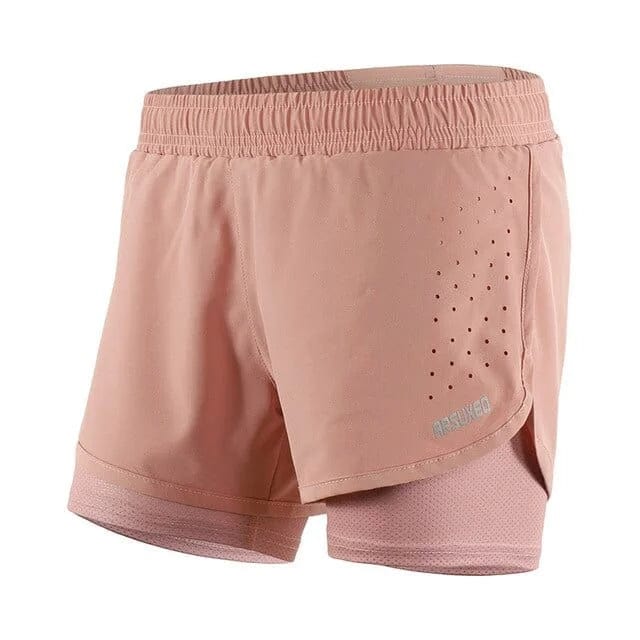 Rosa Sportshorts mit engem Bein, atmungsaktivem Material und elastischem Bund, ideal für Fitness und Laufen. Perfekte Passform und Komfort.
