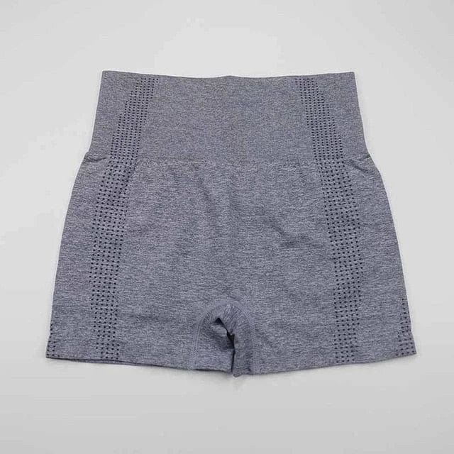 Graue Sportshorts mit hoher Taille, atmungsaktivem Material und nahtlosem Design. Ideal für Fitness, Yoga und Laufen. Größe S.
