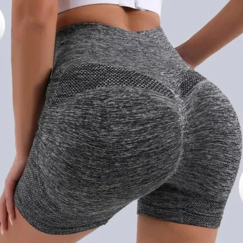 Graue Sportshorts mit hoher Taille für Damen, nahtloses Design, ideal für Fitness und Yoga. Bequeme Passform, atmungsaktives Material.