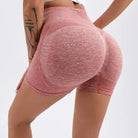 Damen Sportshorts mit hoher Taille in Rosa, nahtlos und atmungsaktiv, ideal für Fitness und Yoga. Bequeme Passform, elastisches Material.