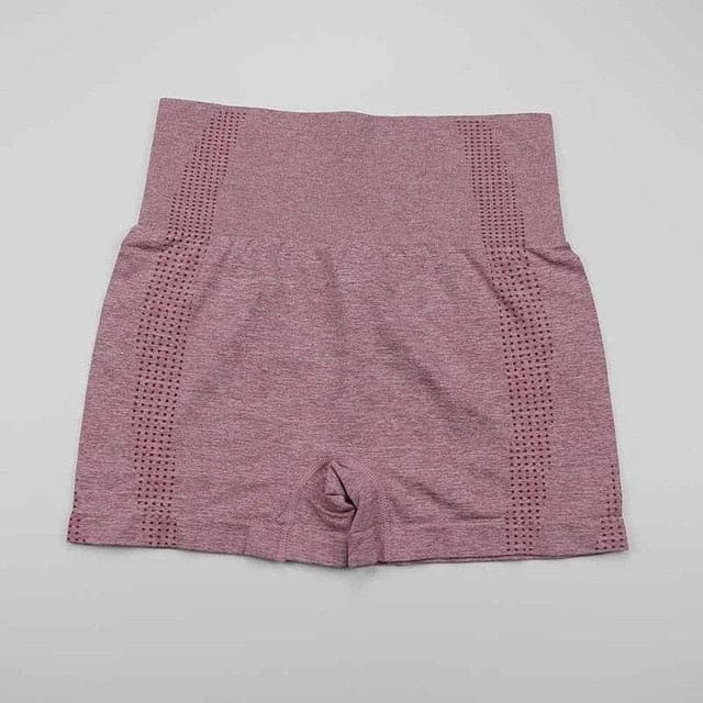 Rosa Sportshorts mit hoher Taille, atmungsaktivem Material und nahtlosem Design. Perfekt für Fitness, Yoga und Freizeitaktivitäten.