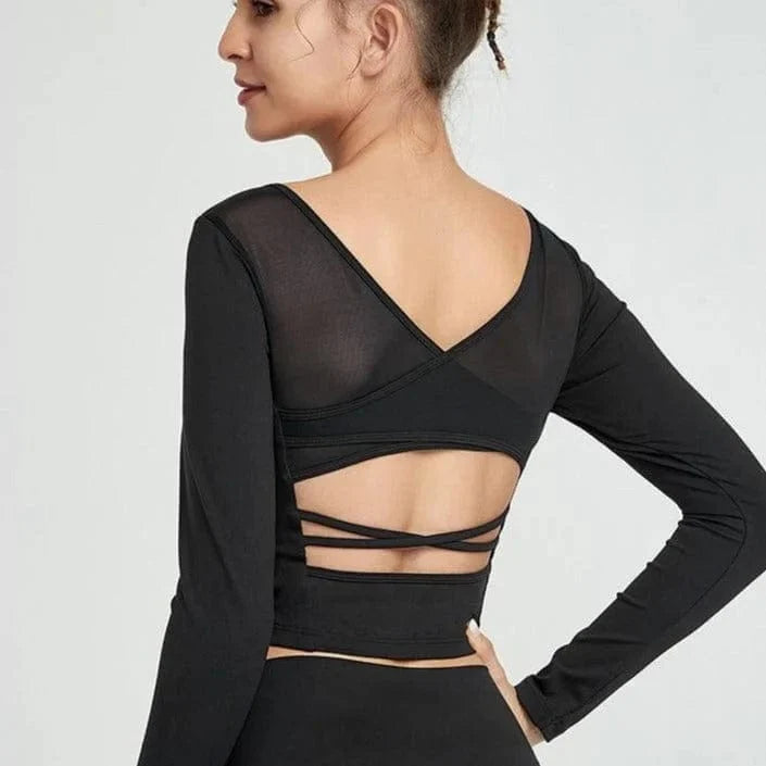 Damen-Sporttop mit offenem Rücken, langärmelig, schwarz. Ideal für Yoga und Fitness. Atmungsaktives Material, modisches Design.