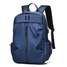 Blauer wasserdichter Rucksack, Laptopfach, USB-Anschluss, ideal für Reisen und Arbeit.