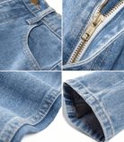 Vintage-Jeans mit hoher Taille, blauer Denim, Detailansicht von Reißverschluss und Nähten. Modetrend, Damenmode, zeitloser Stil.