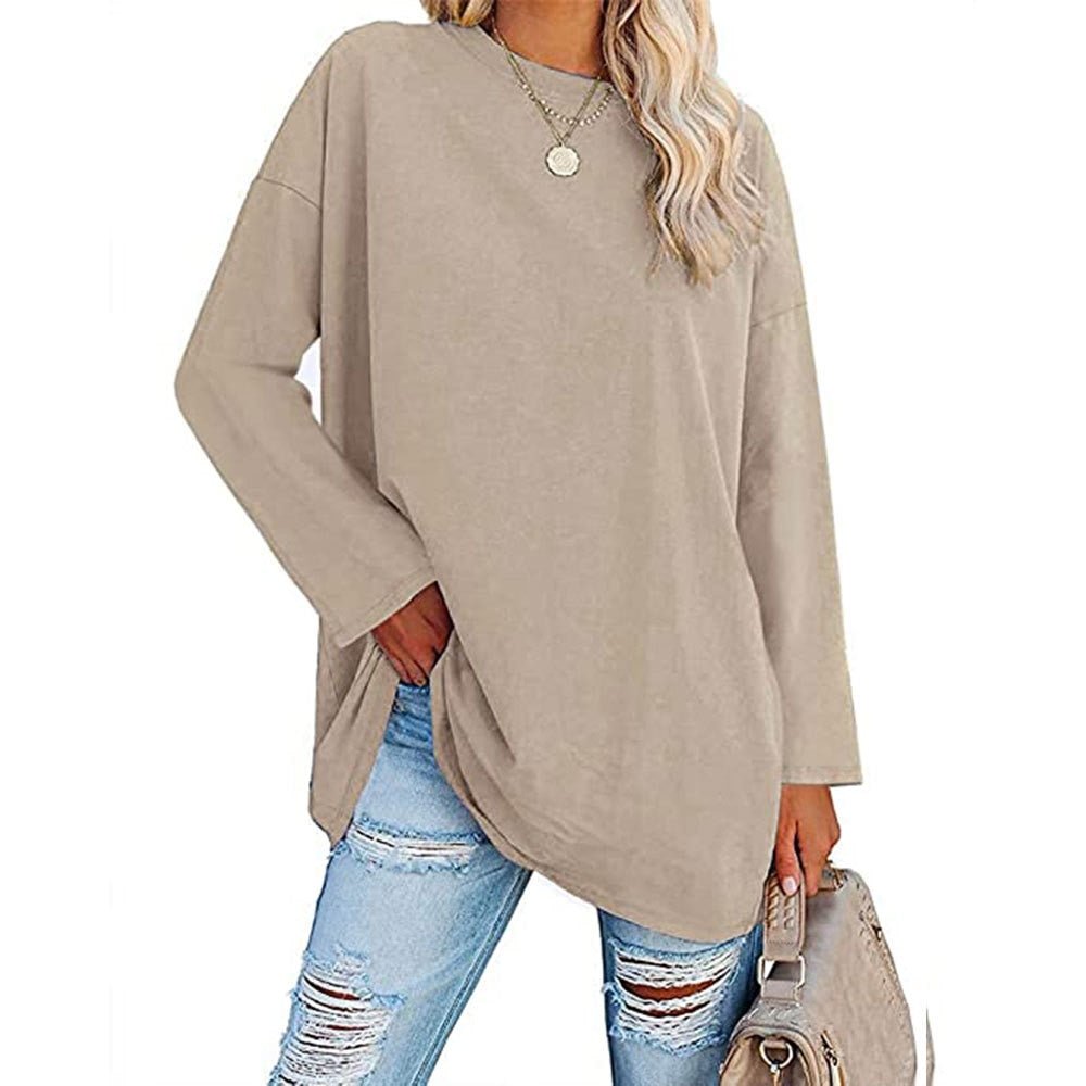 Damen Langarmshirt in Beige, lässig und bequem, ideal für Freizeitoutfits. Perfekt kombiniert mit zerrissenen Jeans und modischen Accessoires.
