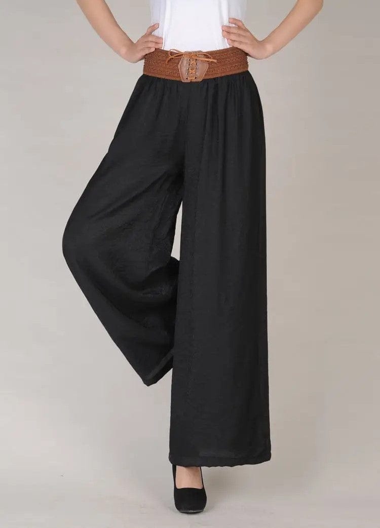 Schwarze Vintage-Hose mit hoher Taille und Schnürung, weiten Beinen, ideal für Retro-Mode-Liebhaber. Perfekt für stilvolle, bequeme Outfits.