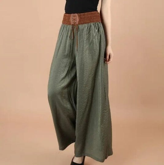 Weite Vintage-Hose mit hoher Taille und Schnürung, ideal für Boho-Mode. Perfekt für stilvolle, bequeme Outfits. Trendige Damenbekleidung.