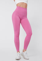 Damen Sportleggings in Pink, nahtlos, ideal für Fitnessstudio und Yoga. Hochwertige, elastische Materialien für optimalen Tragekomfort.