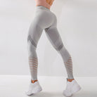 Damen Sportleggings in Grau, nahtlos, ideal für Fitnessstudio und Yoga. Atmungsaktiv, elastisch, figurbetont. Perfekt für Workout und Training.