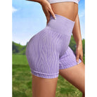 Lila Zebra-Sportshorts für Damen, hoch tailliert, nahtlos, ideal für Fitness und Yoga. Bequeme Passform, atmungsaktives Material.