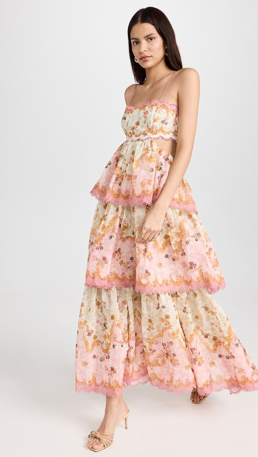 Feminines Maxikleid mit floralen Mustern, rosa und cremefarben, ärmellos, ideal für Sommermode und elegante Anlässe. Perfekt für Damenmode.